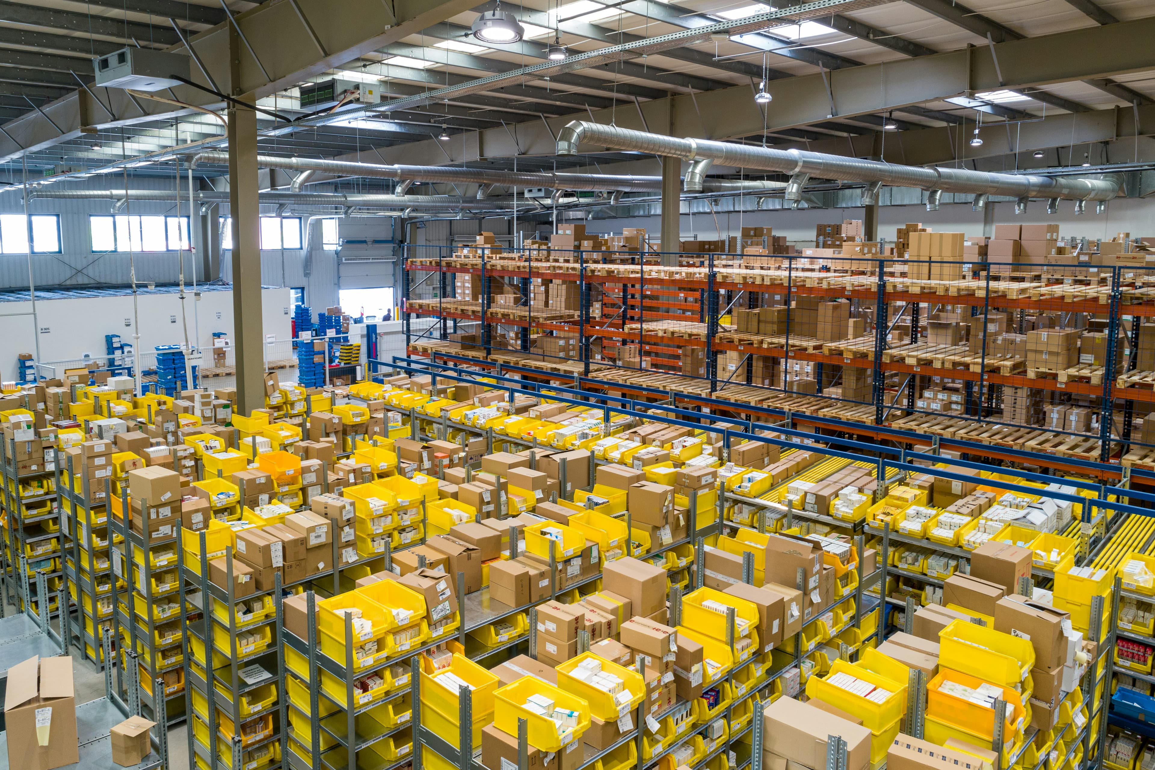 Warehouse handling area with parcels prepared for dispatch.